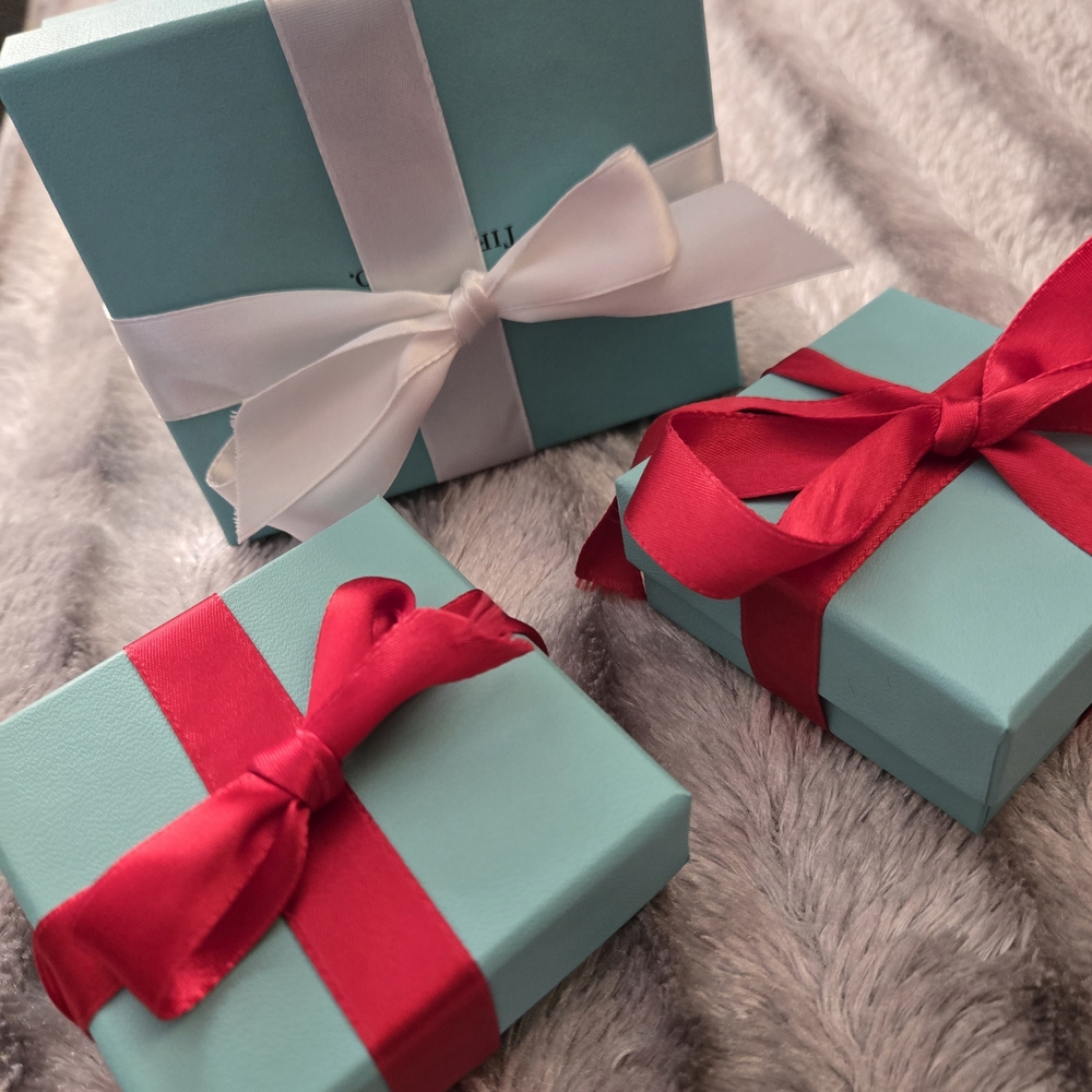 Tiffany & Co. Blue Boxes with Red and White Ribbons